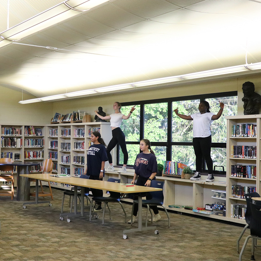 Williams School drama students practice in the library